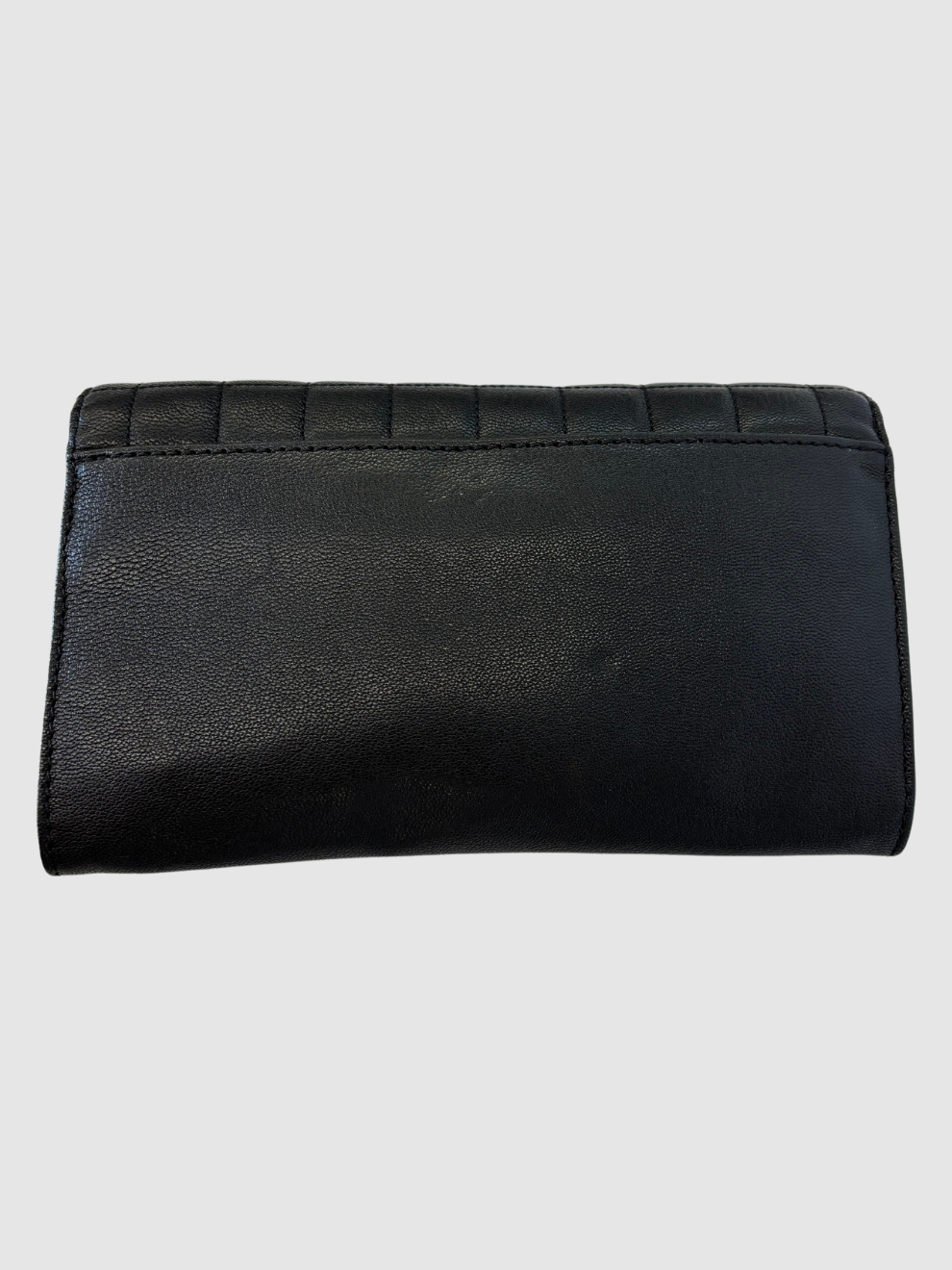 Schwarze gesteppte Leder-Clutch von Michael Kors