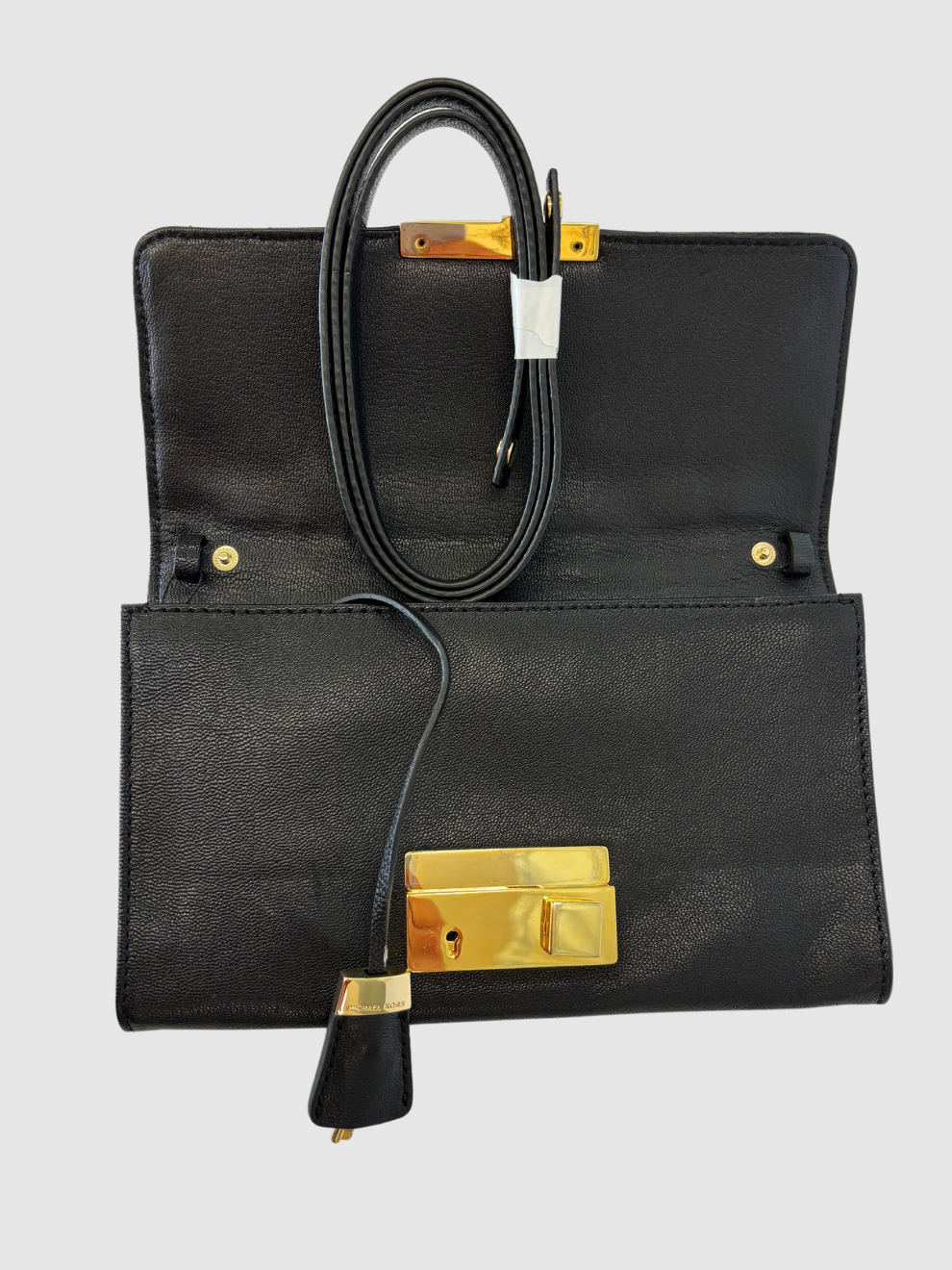 Schwarze gesteppte Leder-Clutch von Michael Kors