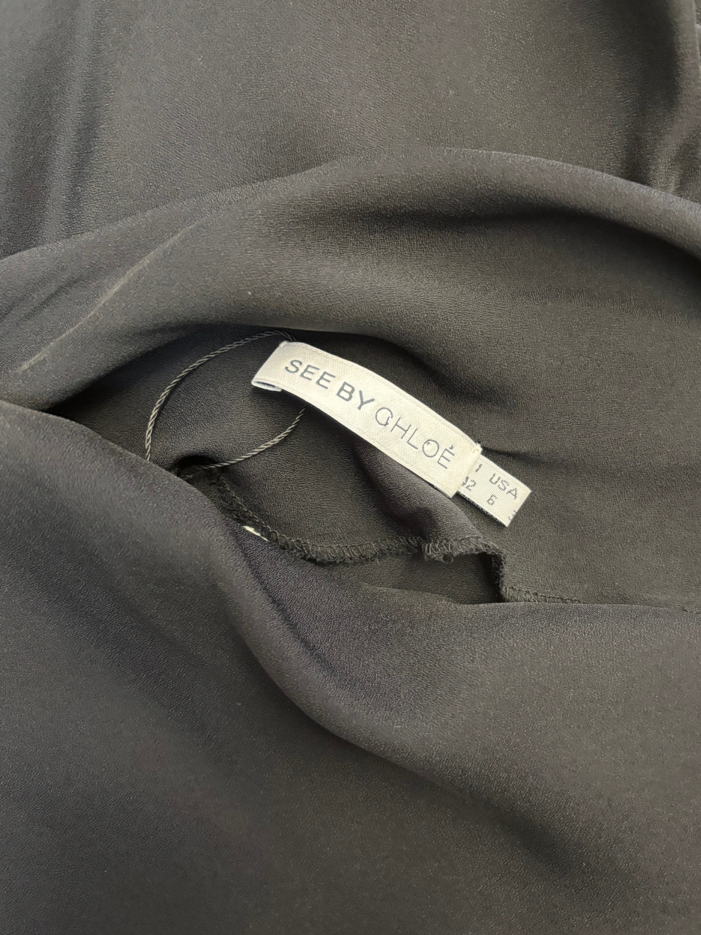 Schwarzes gerafftes Kleid von See by Chloé