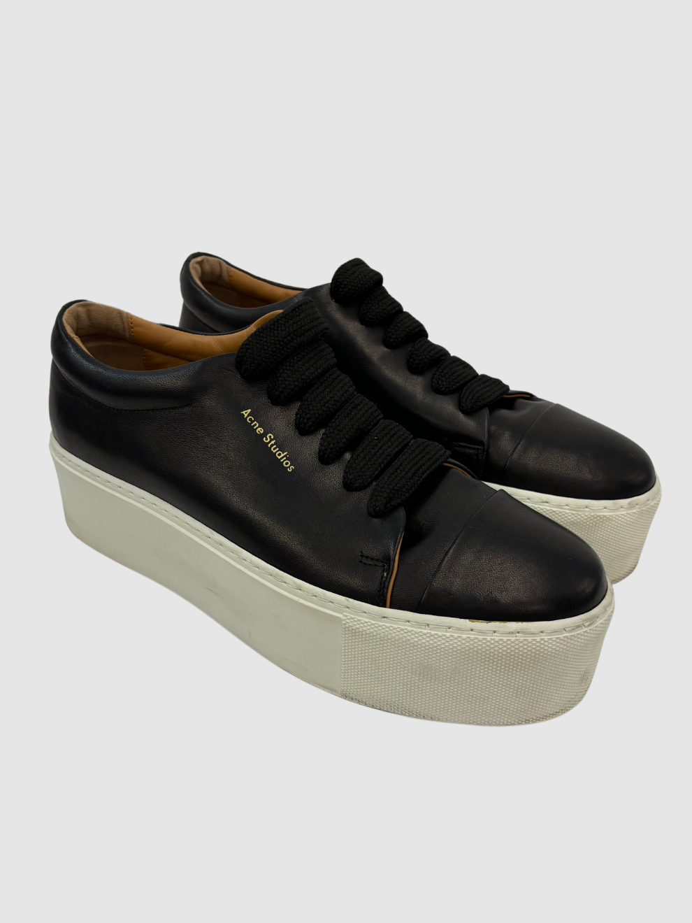 Schwarze Plateau-Sneaker von Acne Studios ELEGANZA