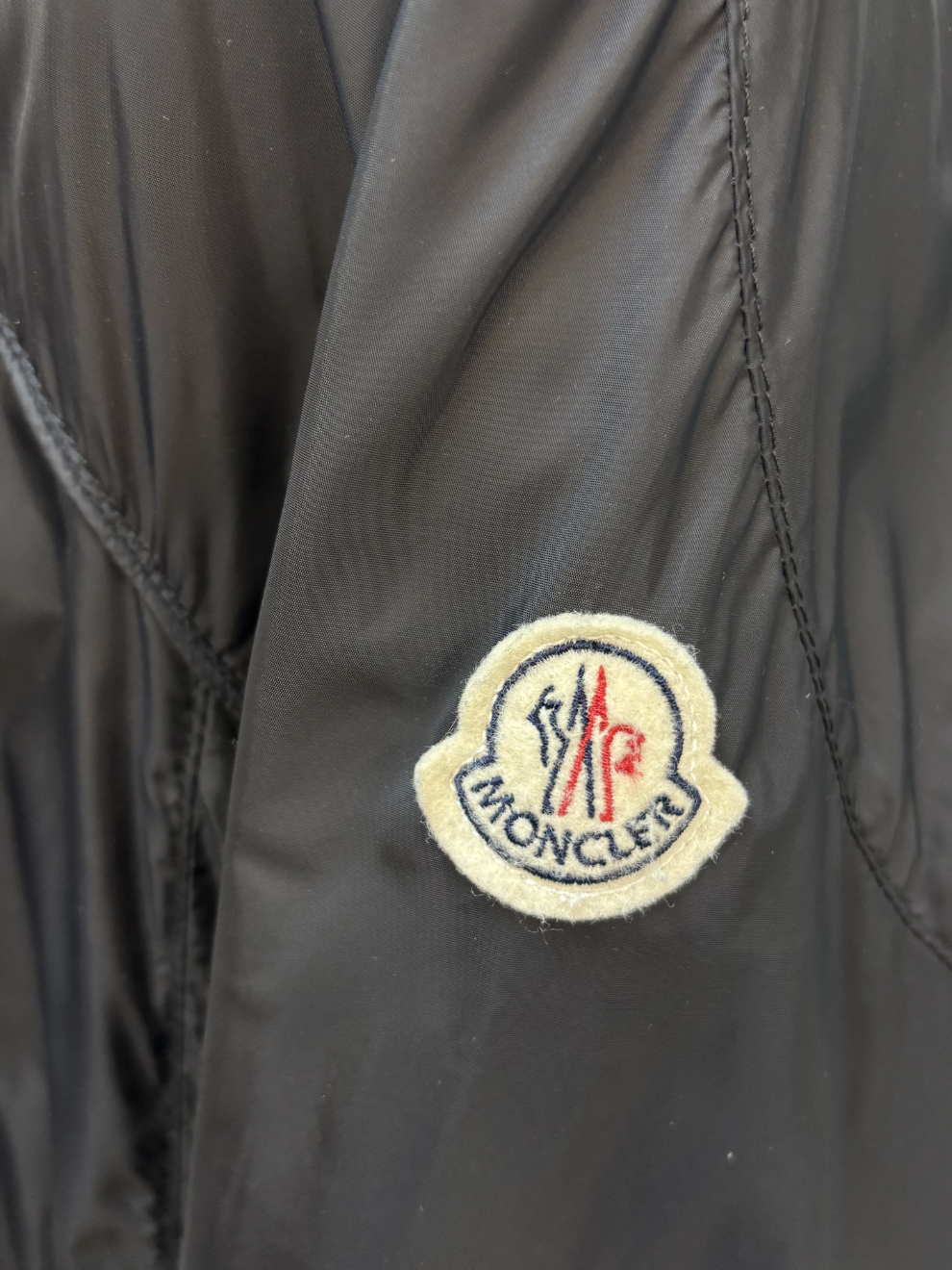 Schwarzer Übergangs Regen Parka Moncler
