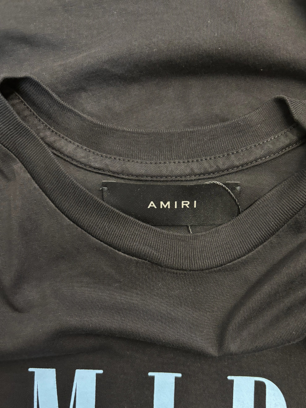 Schwarzes T-Shirt mit Logoprint von Amiri