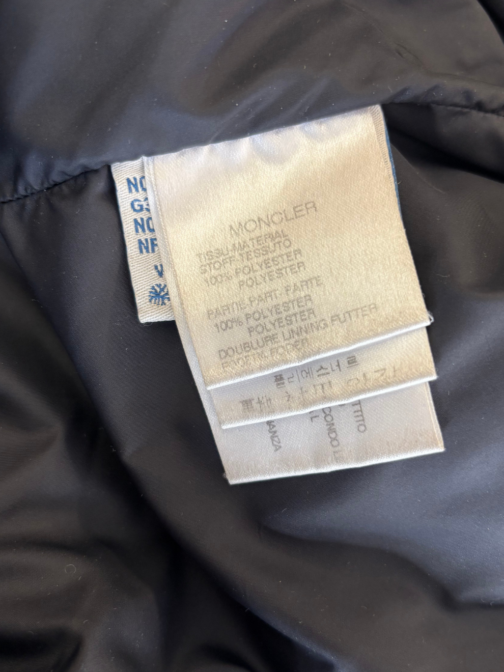 Dunkelbrauner Daunenmantel von Moncler