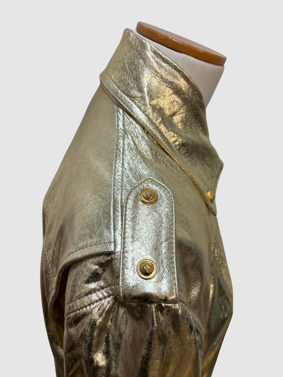 Goldene glänzende Lederjacke von Versus Versace